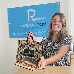 Ruabon Road Dental Practice staff member with teeth whitening kit