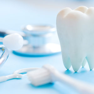Model tooth and dental equipment